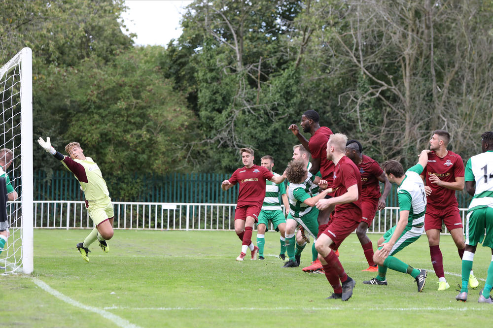 Eusebio Da Silva (4th City player from left) scores the winner (photo: Danny Loo Photography)