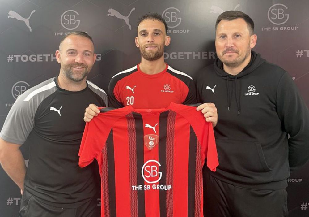 Liam Ferdinand signs