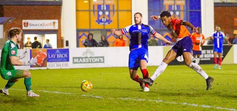 Superb photo of Callum Ebanks scoring for Stratford (Photo Stratford Town FC)