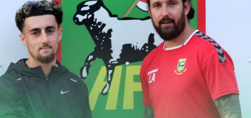 Adam Laaref signs